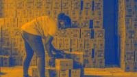 Person packing boxes